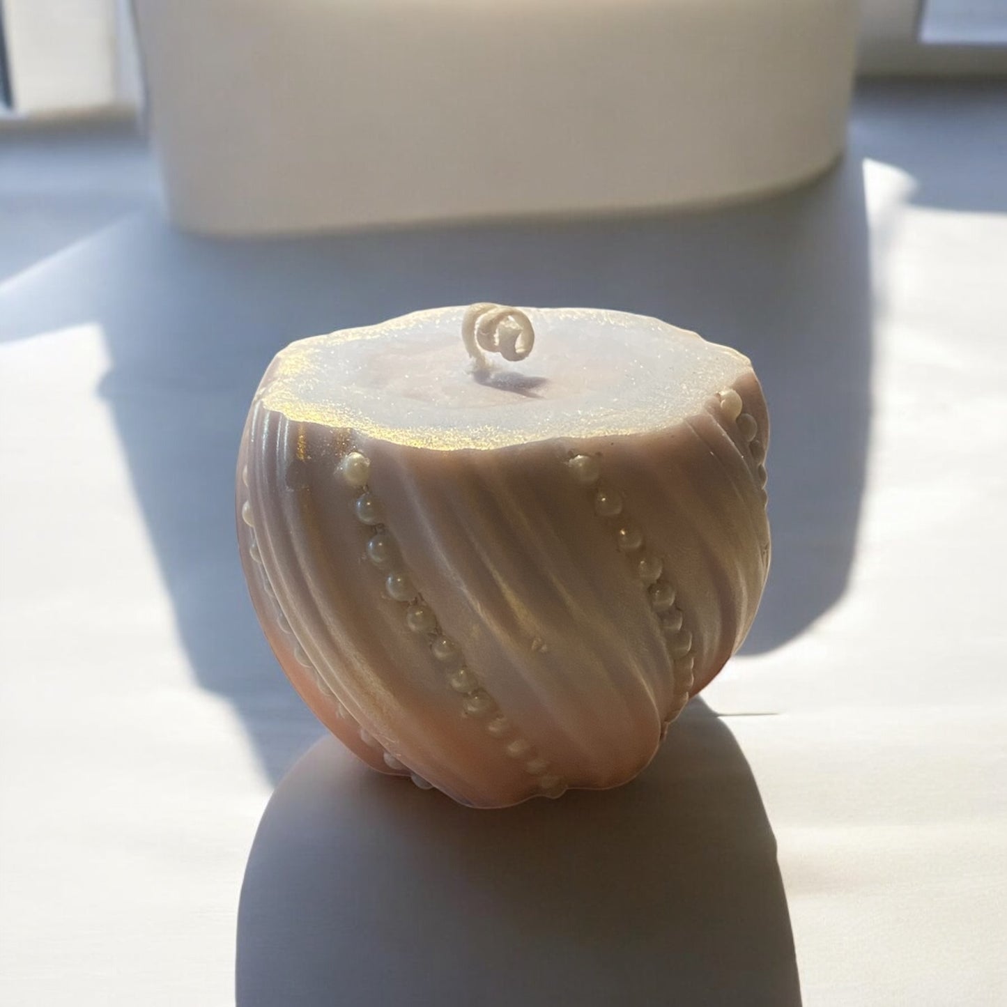 Vela redonda perlada